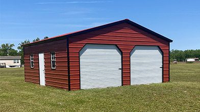 metal building with one door and two car ports